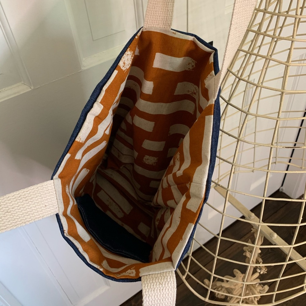 Handmade tote bag with pattern inside.